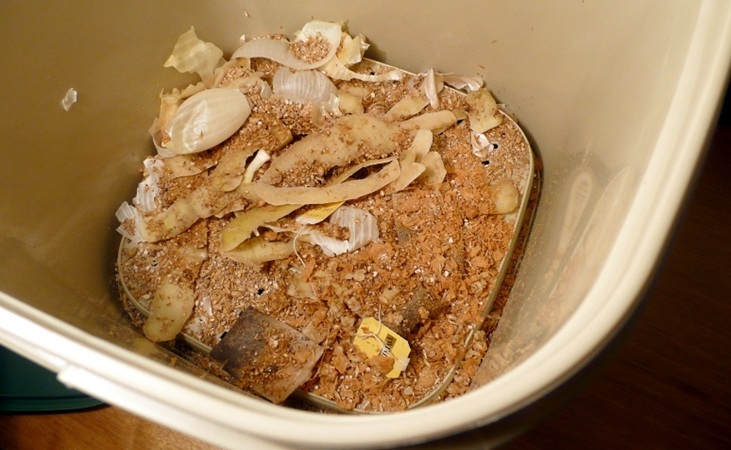 the inside of a Bokashi bin