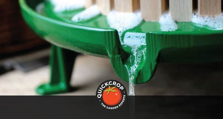 Juice flowing from Vigo fruit press - header image with Quickcrop logo