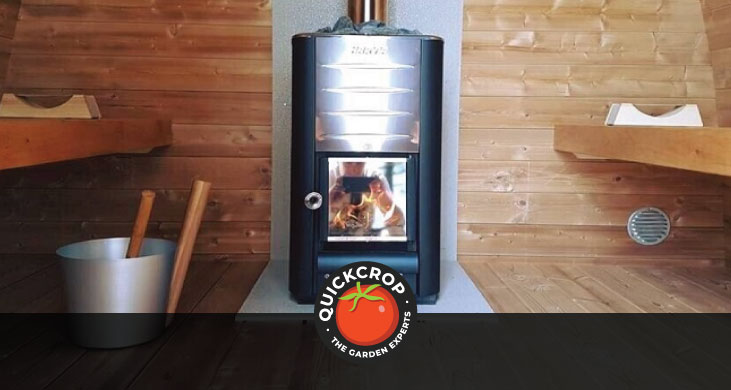 Sauna stove in a wooden sauna - header image