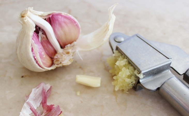 Garlic with garlic press
