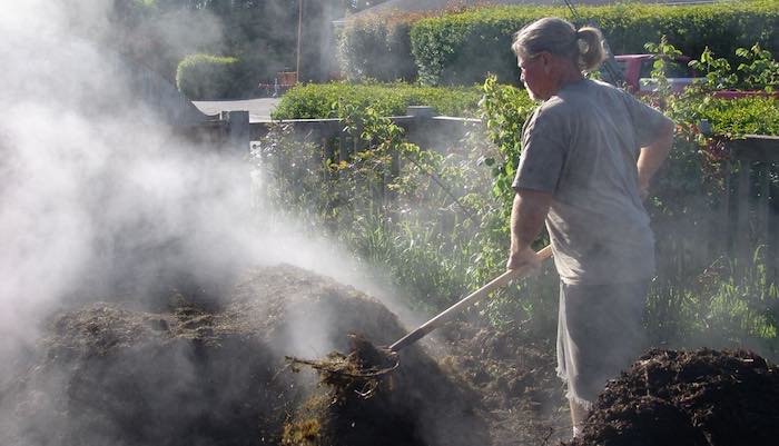Steam coming from a hot compost heap