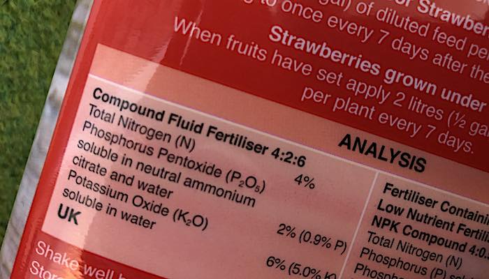 NPK information on the back of a pack of strawberry feed