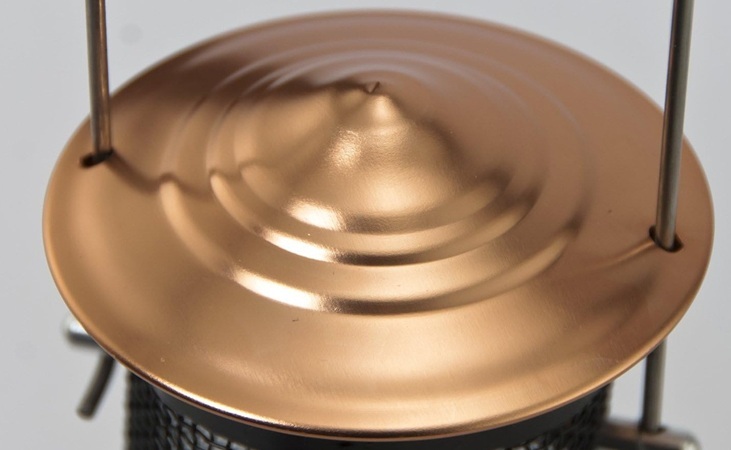 Copper coated lid on a bird feeder Copper coated lid on a bird feeder