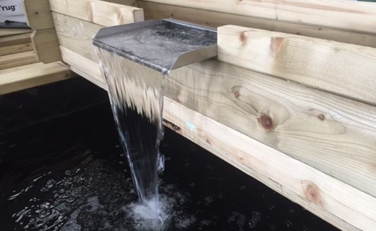 Waterfall-like feature with timber pond Waterfall-like feature with timber pond