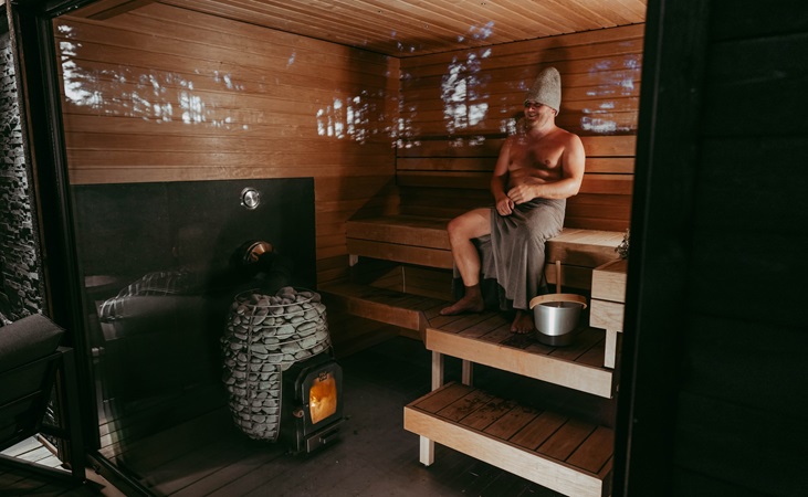 sitting back relaxing in a sauna