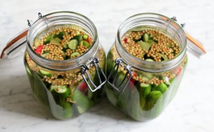 Home pickled sweet cucumber pickles with mustard seed